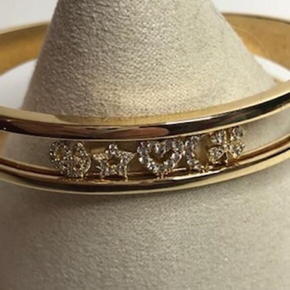 682 Anne Klein goldtone Lucky charms CZ sliding bracelet Peace star heart clover - Picture 1 of 2